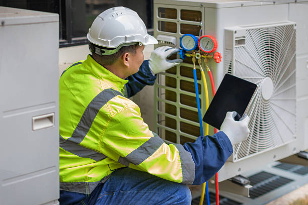 Professional Heat Pump Repair technician working in Clyde, NC